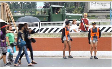 Adult Diaper-clad traffic enforcers in Manila (Photo credit: When In Manila)